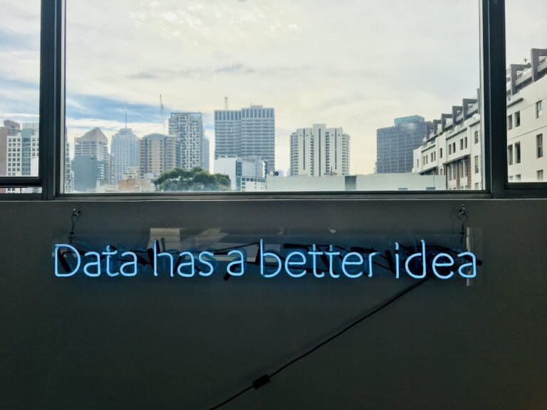 Blue neon sign saying Data has a better idea, Data Scientist