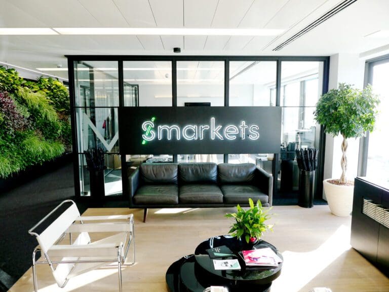 Smarkets Office with a leather sofa and coffee table in the reception