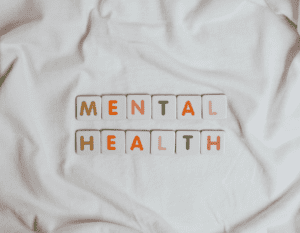 Mental Health written in tiles, World Mental Health Day
