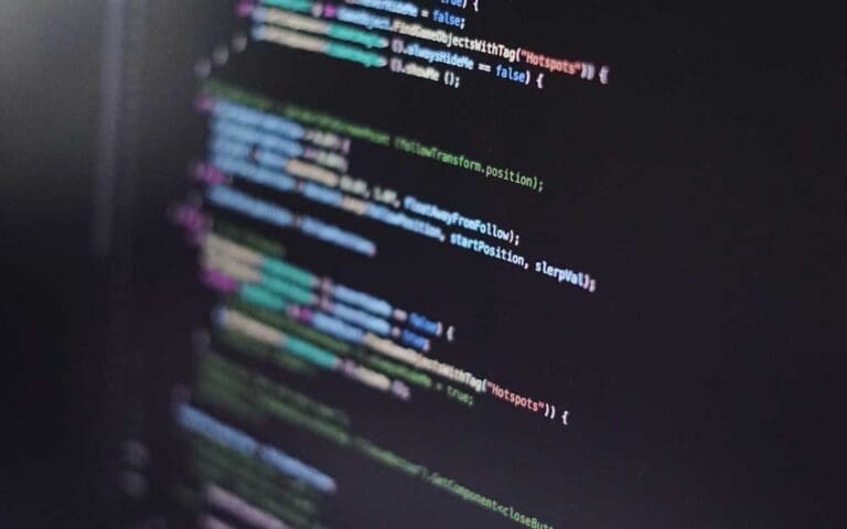 Black computer screen showing C# coding