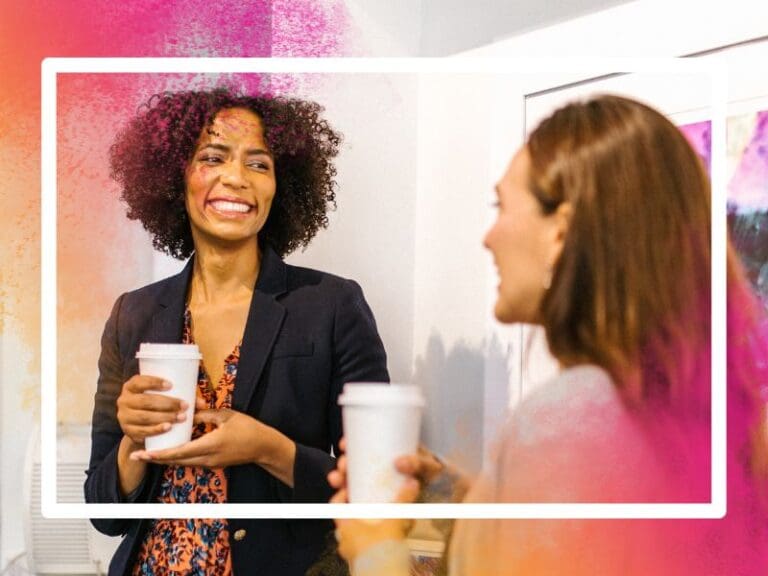 Group of women discussing tech in a cafe
