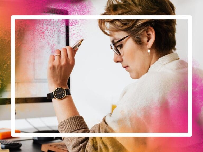 Focused female employee reading documents during work in office, systems analyst
