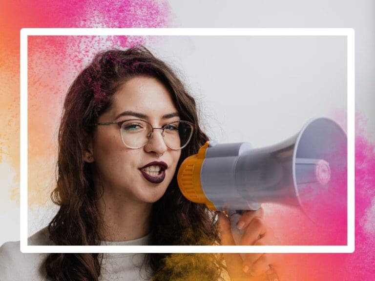 Woman with megaphone announcing International Day of Women & Girls in Science