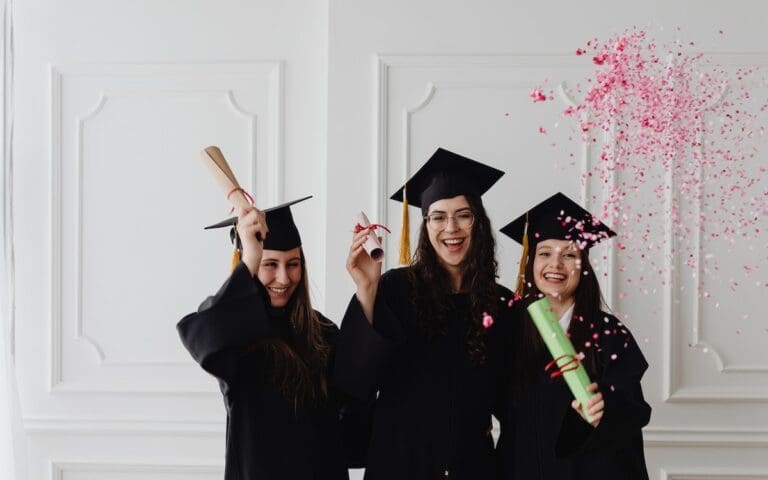 Group of female graduates celebrating their graduation