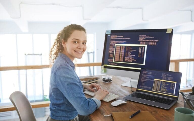 Female IT Developer working at a computer