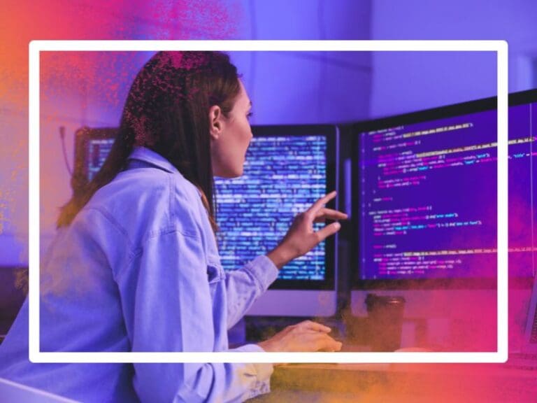 Women working in office in front of computer screen