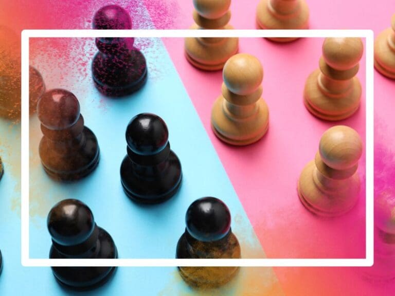 Equal wooden people shown on blue background and pink background, gender equality and gender disparity concept