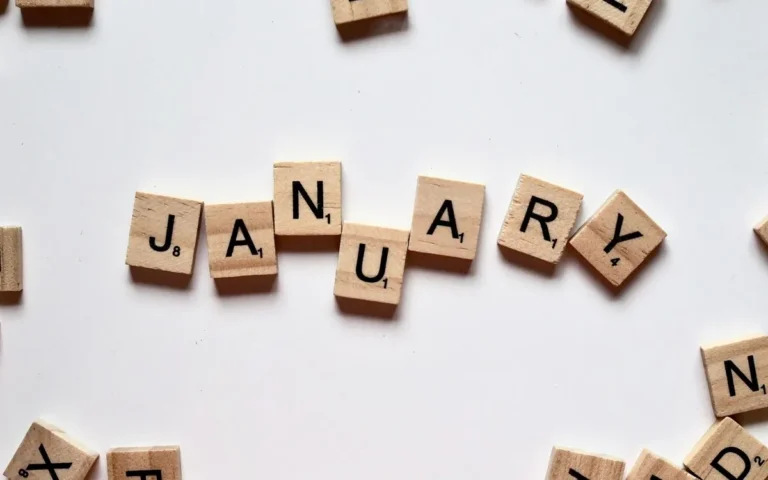 January spelled out with Scrabble tiles