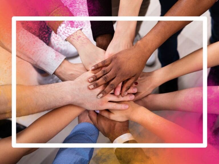 Lots of diverse hands on top of one another, diversity concept