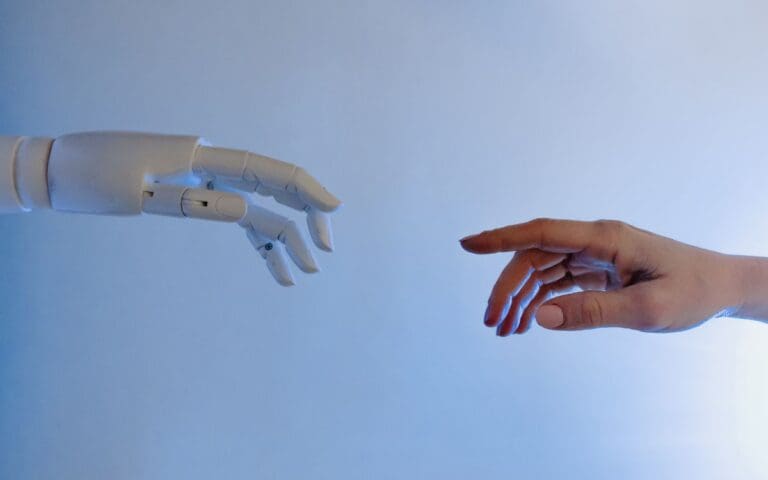 Person reaching out to a robot, Artificial Intelligence, Ethics concept