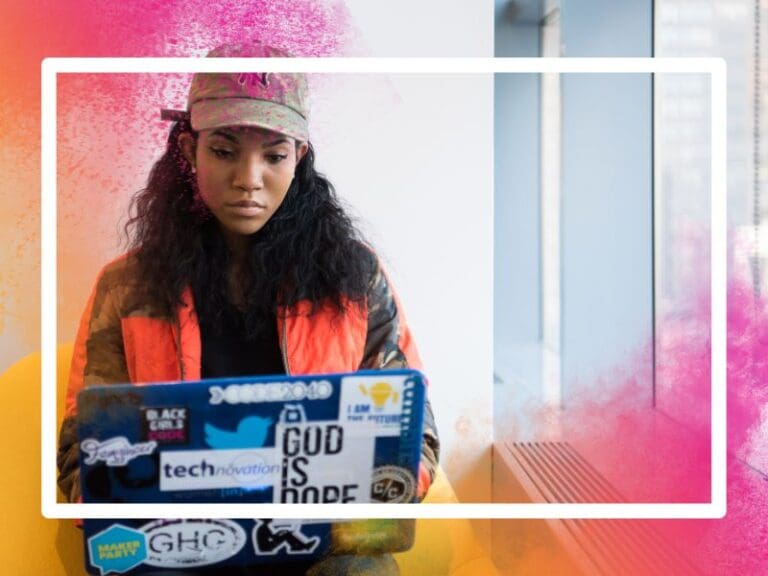 Beautiful Female Engineer Working on Personal Computer in the High-Tech