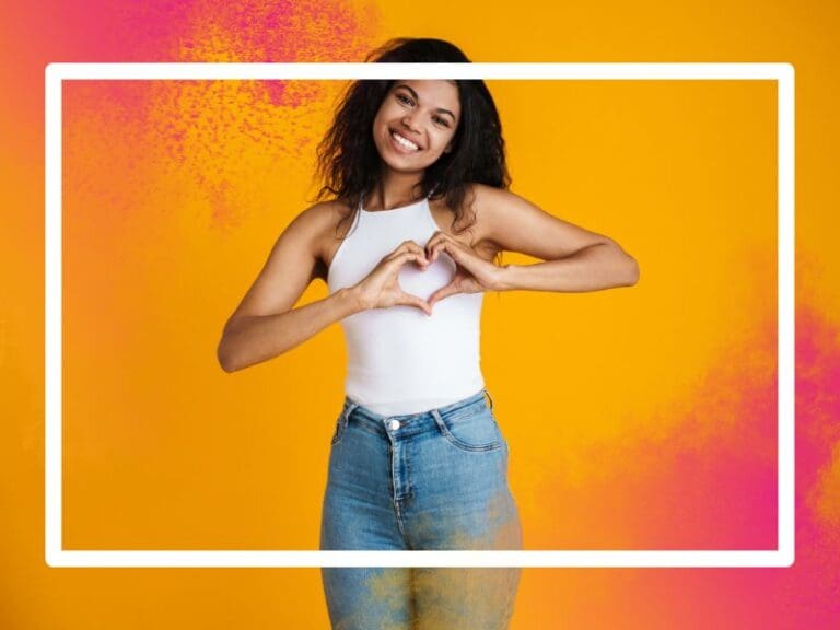 Beautiful Young Woman Making a Heart Shape Using Her Hands, International Women's Day Inspire Inclusion campaign