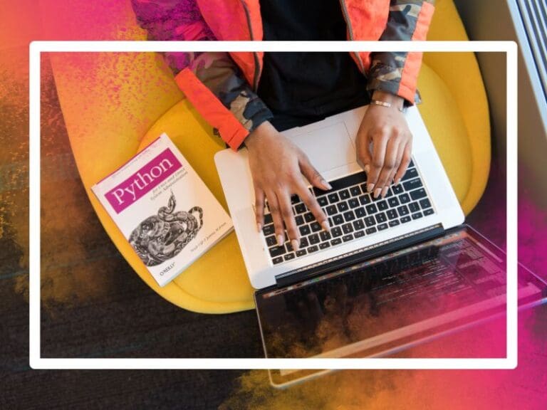 Woman programming on a MacBook