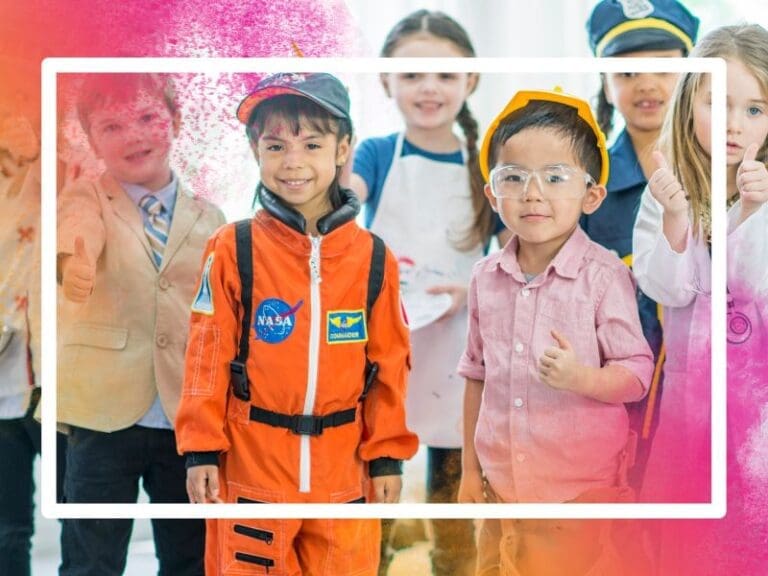 A multi-ethnic group of children at kindergarten dressed in STEM career related outfits