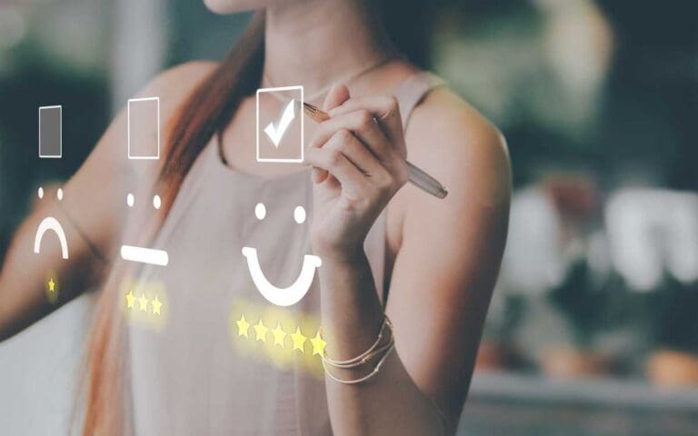 Business woman pressing smiley face emoticons to represent customer experience