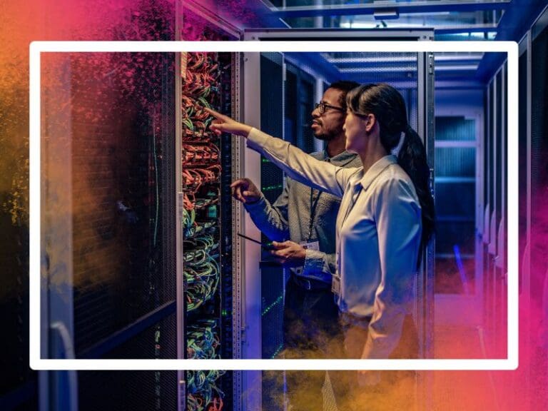 Man and woman in server room checking cybersecurity