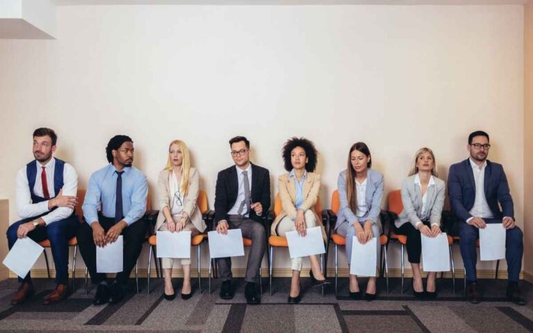 Photo of candidates waiting for a job interview, interview red flags