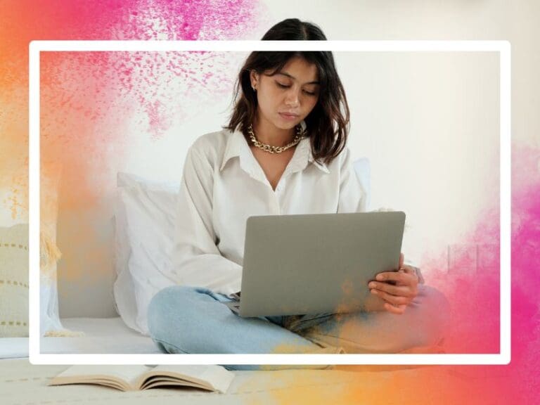 Woman working on her portfolio on a laptop