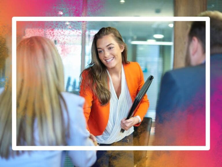 Young woman starting a new tech job meets colleagues.