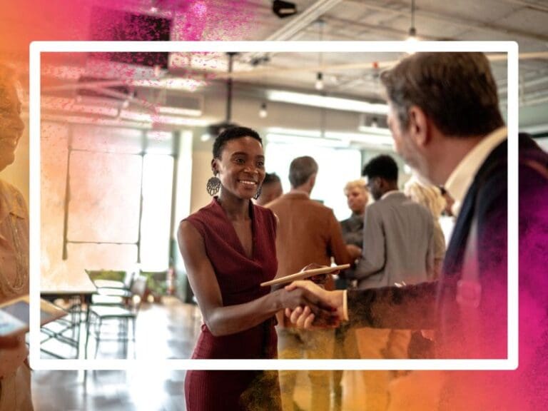 Business people shaking hands at business event