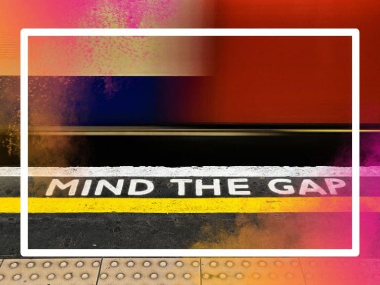 Mind the gap sign on the floor of the London Underground, gender pay gap concept