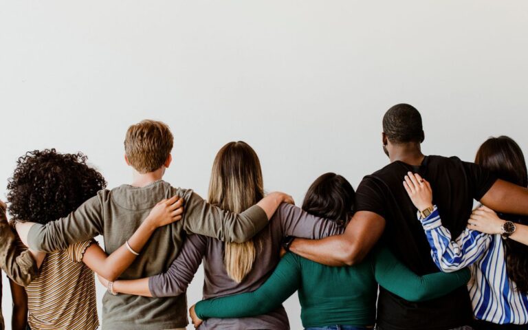 diverse people hugging each other, diversity