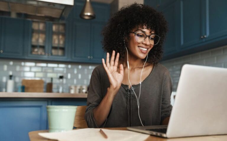 Attractive Smiling Young African Woman on a Video Call, Motivate Women Freelancers concept