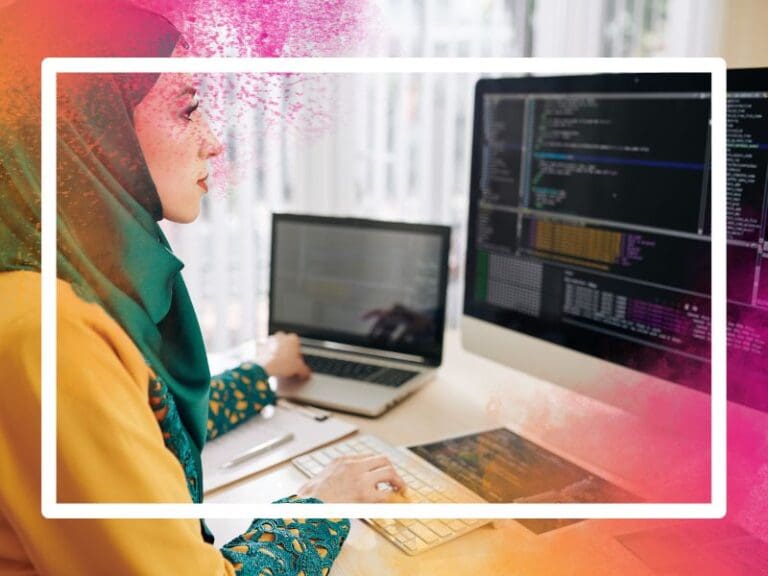 POV of a female coder inputting coding language on a laptop