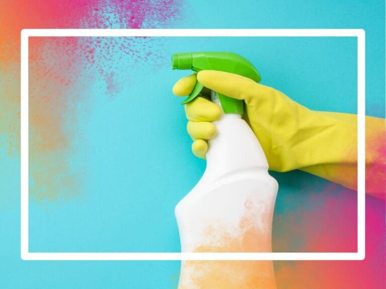 Closeup of a hand holding a spray bottle of cleaning fluid, spring clean your career concept