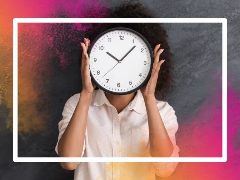 Woman holding a clock in front of her face, time management concept