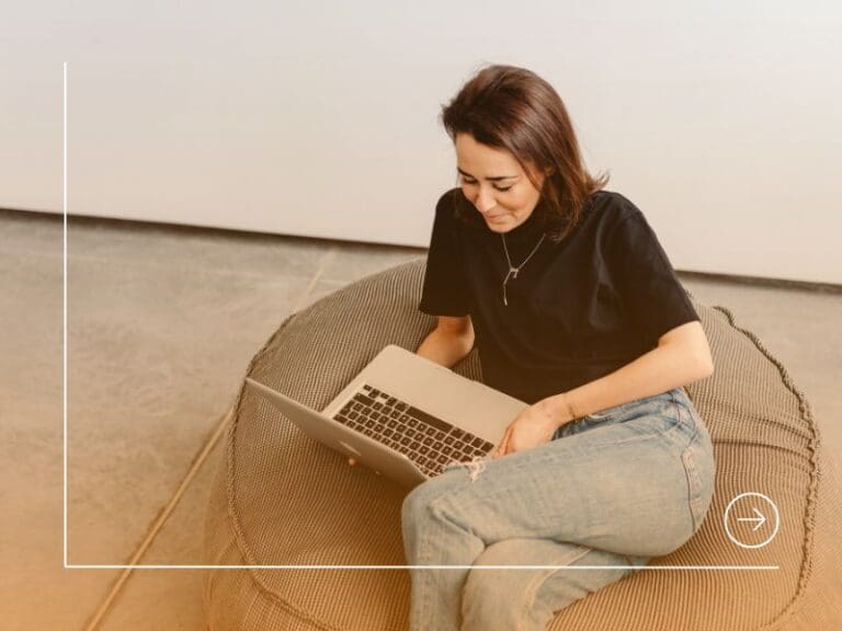 A Woman in a Black Shirt Using a Laptop, community concept