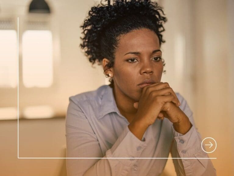 A focused adult African-American woman, thinking about her future, worried woman, anxiety concept
