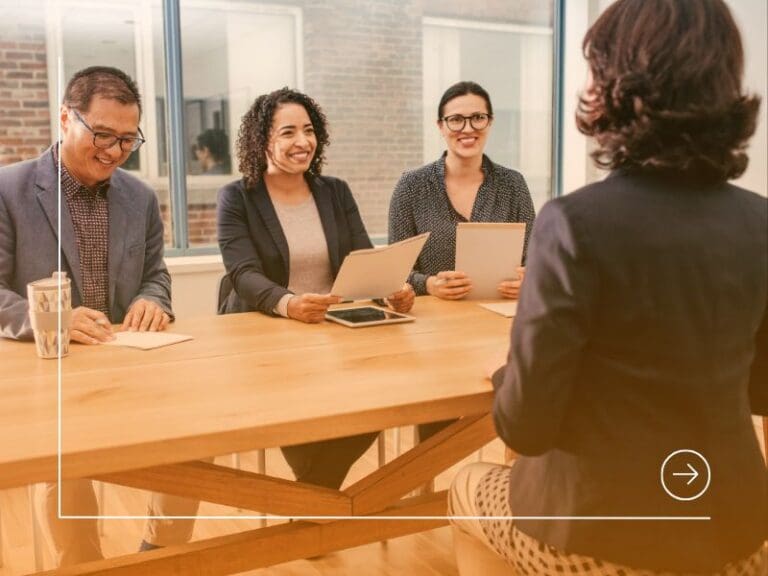Woman being interviewed for a job in a competitive job market