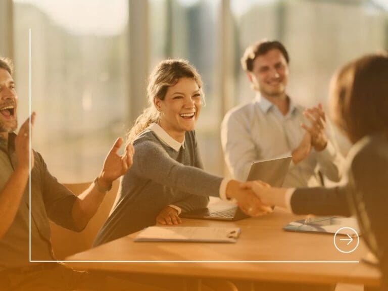 Woman shaking hands with new colleague after she got the job, career growth concept